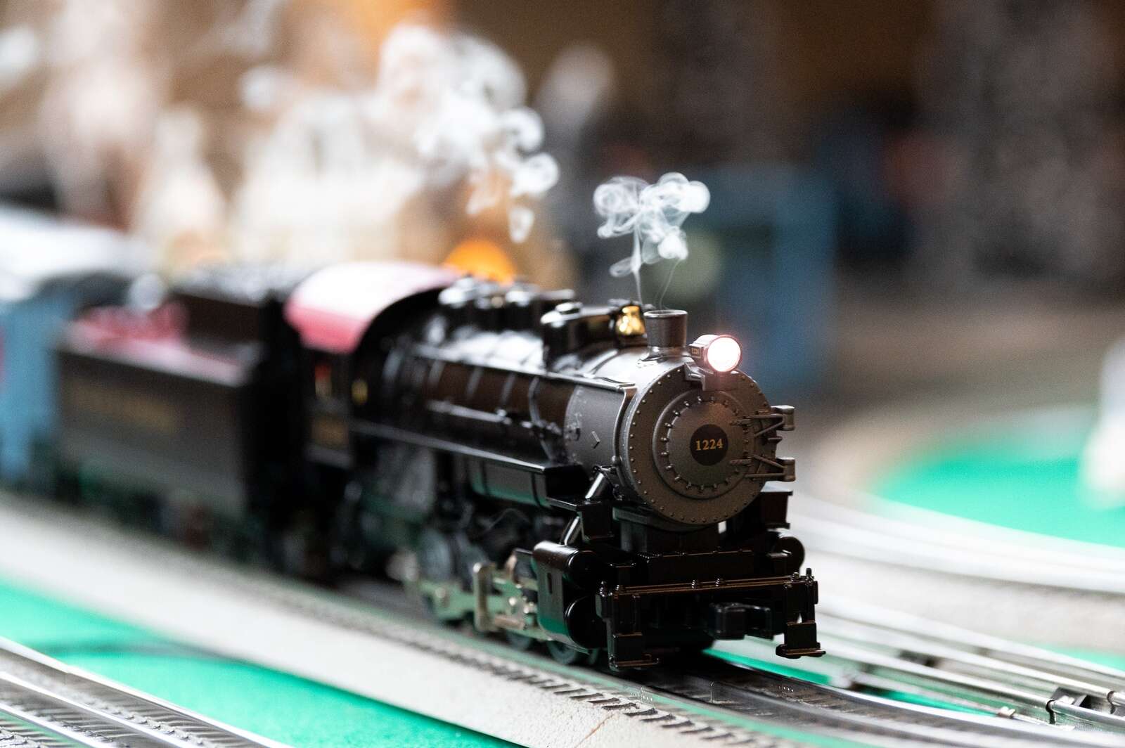 A model steam locomotive running on our family layout